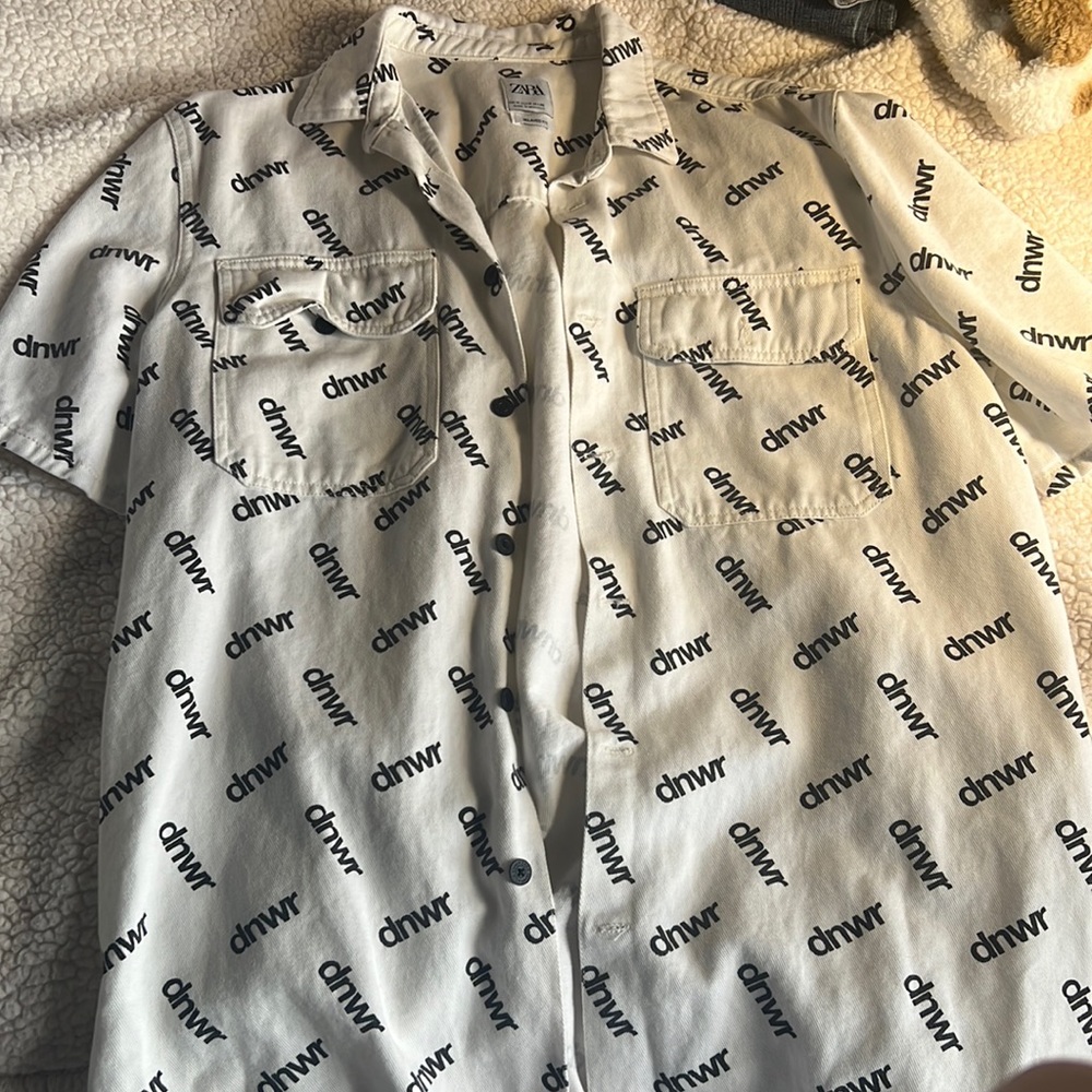 This is a lose fit Denim top for men the brand is Zara